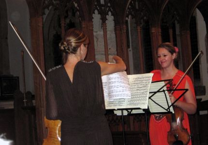 Retorica, 2 violinists who played a concert in the church